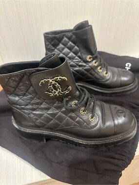 CHANEL Black Quilted Leather Combat Boots with Gold CC Accents